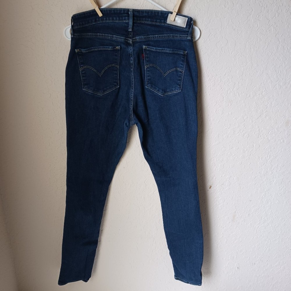 Levi's high rise skinny jeans. Dark blue denim.